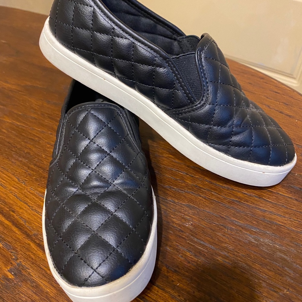 Black slip on quilted print shoes